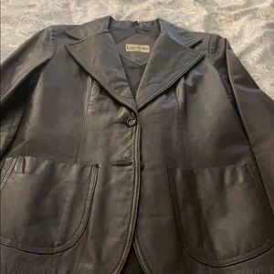 Canadian made 100% brown leather jacket.